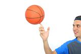 Young man playing basketball isolated