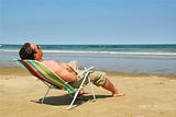 Man relaxing on beach