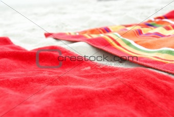 Beach towels on sand