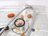 Stethoscope & Drugs on medical book