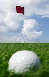 golf ball and flag