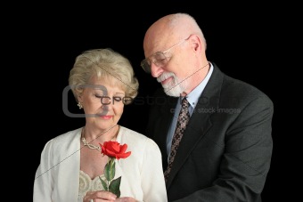 Senior Couple on Black - Romantic Gesture