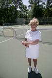 Senior Lady Plays Tennis