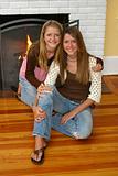 Beautiful Sisters By Fireplace