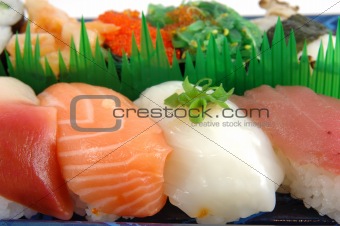 Surf clam, salmon, squid and tuna sushi