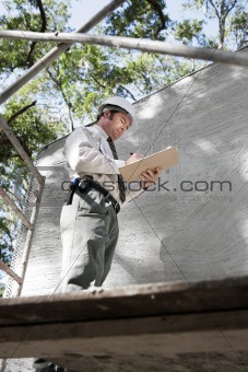 Building Inspector on Scaffolding