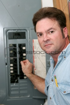 Electrician At Breaker Panel