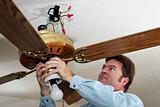 Electrician Removes Ceiling Fan