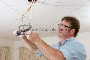 Electrician Straightents Wire
