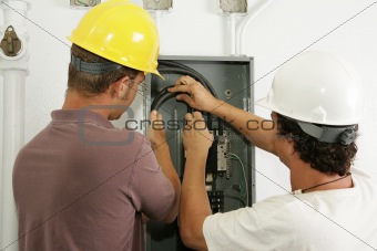 Electricians Install Panel
