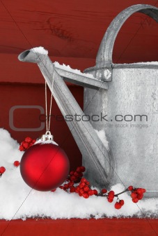 Red ornament on watering can