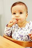 Small cute baby eating