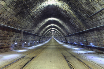 A train disappearing into a tunnel