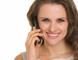 Portrait of beautiful young woman having mobile phone call