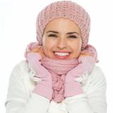 Happy woman wrap self up in knit scarf