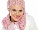Portrait of happy woman in knit winter clothes