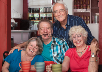 Laughing Seniors in Cafe