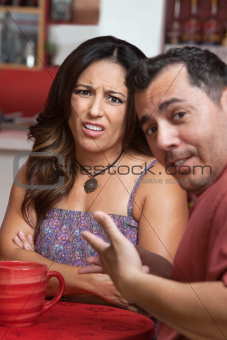 Disgusted Woman with Man in Cafe