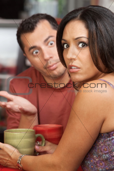 Couple Arguing in Cafe