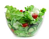 Salad in a glass bowl on a white background