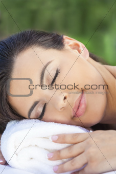 Beautiful Young Woman Relaxing At Health Spa