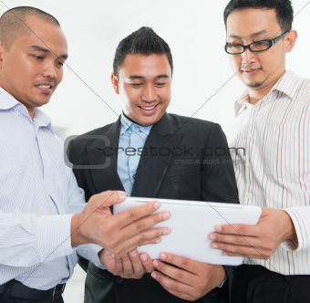Southeast Asian businessmen discussion