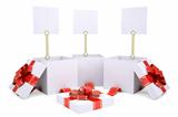 Open gift boxes with white labels