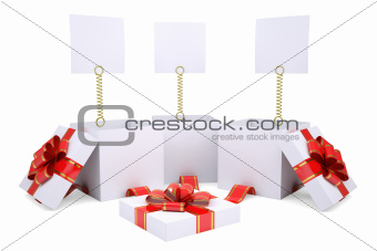 Open gift boxes with white labels