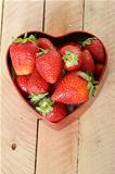 fresh strawberries in a heart shaped box