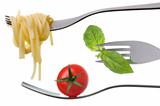 spaghetti basil and tomato on forks isolated
