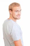portrait of a young man with blond hair standing- isolated on white