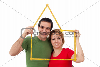 Happy couple with meter
