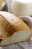 fresh white loaf of bread, rustic style