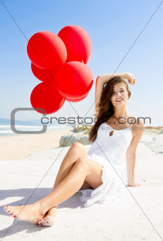 Girl with red ballons
