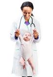 Doctor and baby on a white background