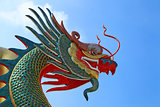 Head of Dragon on the blue sky