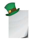 Curled page and St. Patrick's Day hat with clover