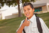 Happy Young Hispanic School Boy with Thumbs Up