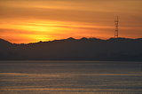 Sutro Tower admires the sunset over San Francisco bay