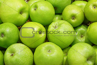 Closeup of many green apple fruits