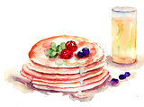 Pancakes stack with fresh berries and juice