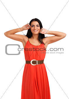 Young woman in coral dress