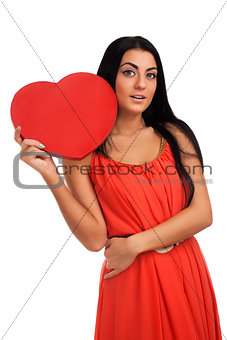 Woman holding Valentines Day heart sign