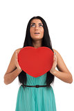 Woman holding Valentines Day heart sign