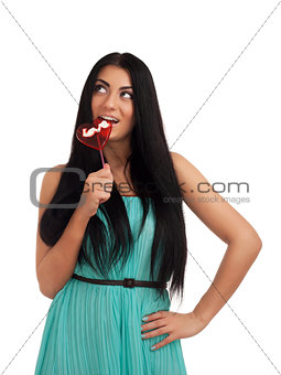 Girl holding heart candy