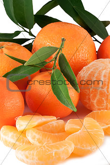 tangerines with leaves and silces