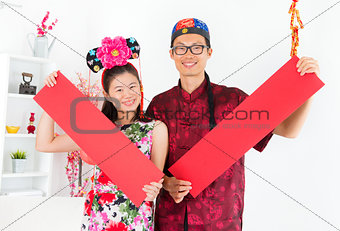 Asian people Showing red spring couplets