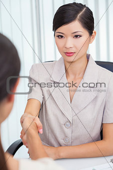 Asian Chinese Woman or Businesswoman Shaking Hands