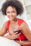 Mixed Race African American Girl Drinking Red Wine