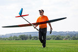 Man holds the RC glider